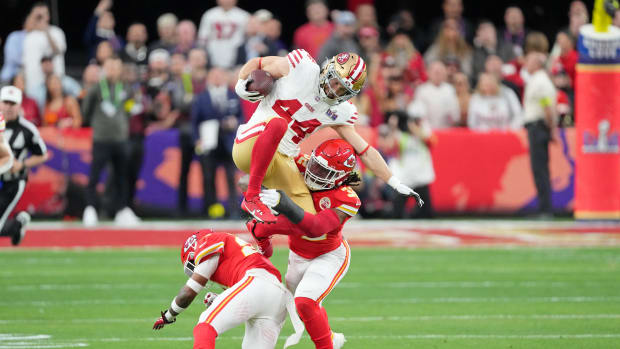Feb 11, 2024; Paradise, Nevada, USA; San Francisco 49ers fullback Kyle Juszczyk (44) runs with the ball against Kansas City Chiefs linebacker Nick Bolton (32) during the first quarter Super Bowl LVIII at Allegiant Stadium. Mandatory Credit: Kyle Terada-USA TODAY Sports  